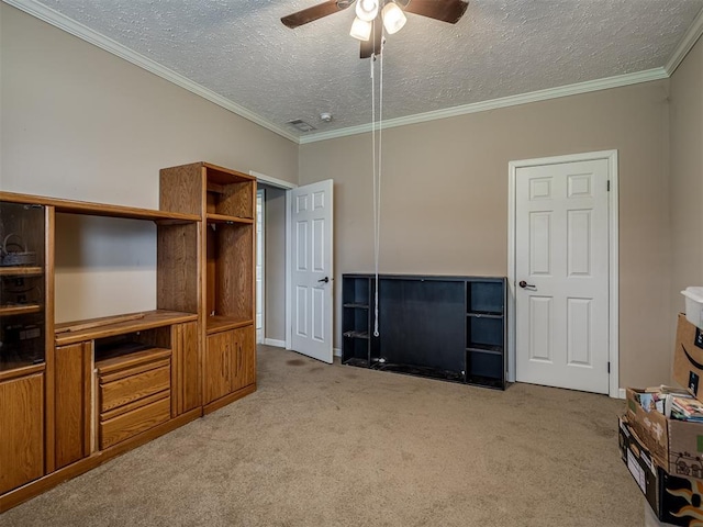 4124 E Horseshoe Ln, Moore, OK 73160 - unfurnished living room with carpet floors, ornamental molding, a ceiling fan, and a textured ceiling