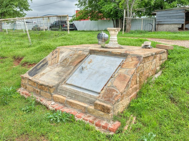 4124 E Horseshoe Ln, Moore, OK 73160 - view of storm shelter with a lawn and fence