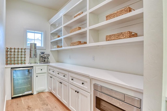 pantry featuring wine cooler