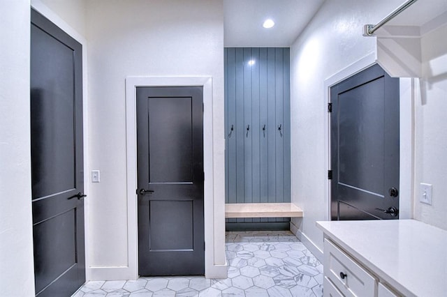 bathroom featuring tile patterned floors, vanity, recessed lighting, and baseboards