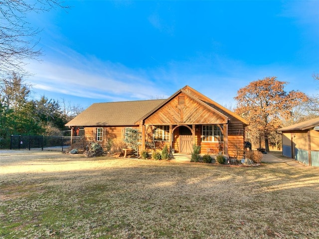 20498 SE 15th St, Harrah, OK 73045 - ranch-style house featuring log exterior, a front lawn, covered porch, and fence