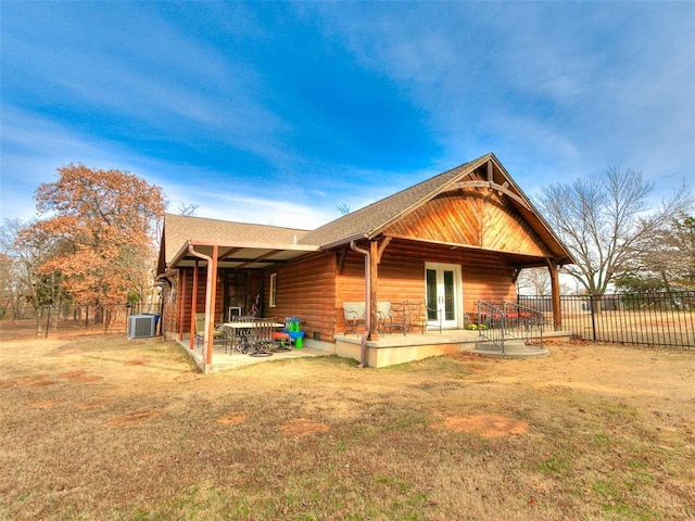 20498 SE 15th St, Harrah, OK 73045 - view of property exterior with fence, a yard, central air condition unit, a patio area, and french doors