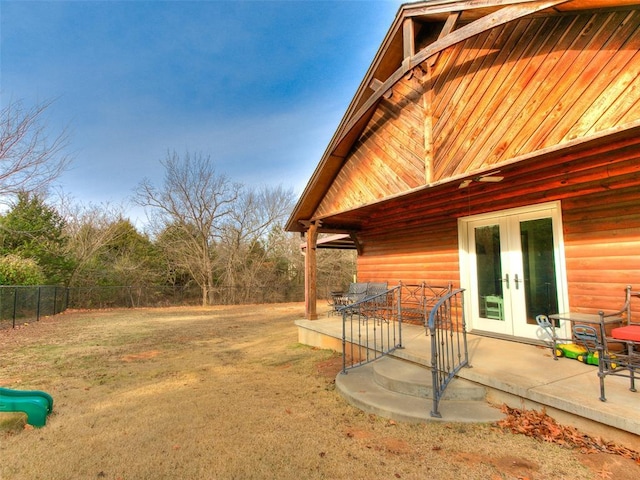 20498 SE 15th St, Harrah, OK 73045 - view of yard featuring french doors and fence