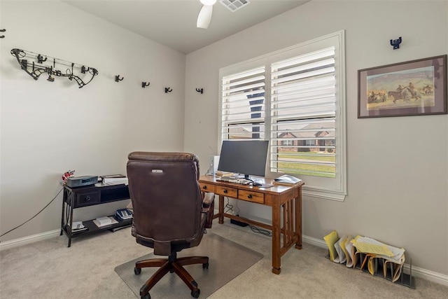 office space featuring ceiling fan, carpet flooring, and baseboards