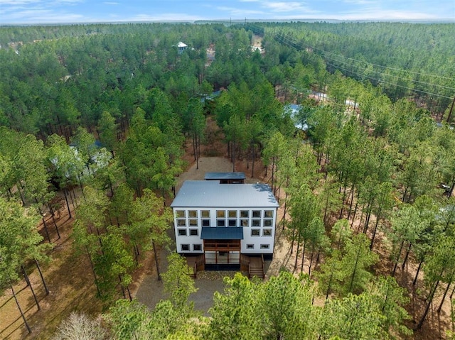 drone / aerial view with a forest view