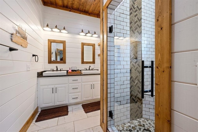 full bathroom with a sink, wood ceiling, wooden walls, and a shower stall