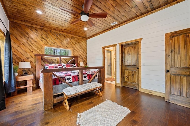 bedroom featuring visible vents, wood walls, hardwood / wood-style floors, recessed lighting, and wood ceiling