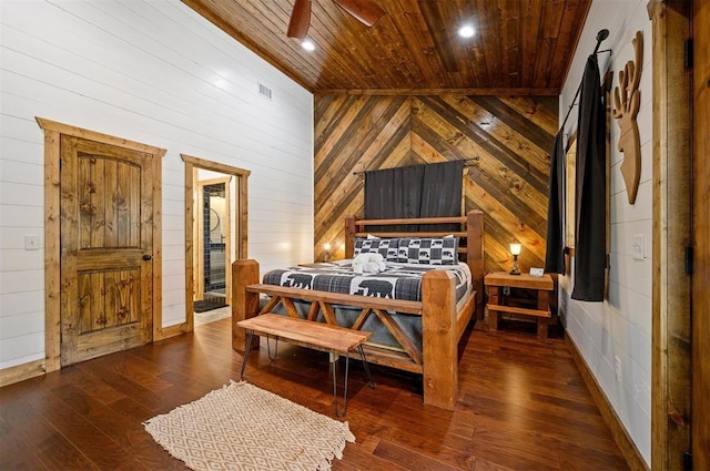 bedroom featuring wood ceiling, visible vents, wooden walls, recessed lighting, and hardwood / wood-style floors