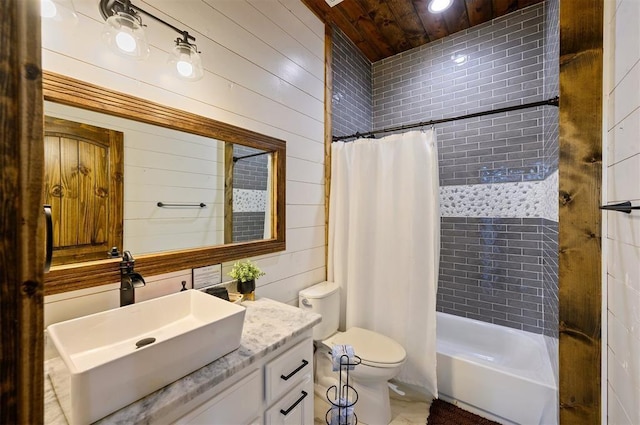full bath featuring vanity, toilet, shower / bath combo with shower curtain, wood walls, and wooden ceiling