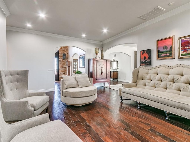 6363 NW 220th St, Edmond, OK 73025 - living area with arched walkways, baseboards, visible vents, dark wood-type flooring, and ornamental molding