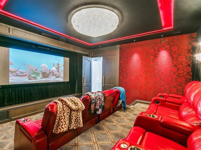 6363 NW 220th St, Edmond, OK 73025 - carpeted home theater room with wallpapered walls and a tray ceiling