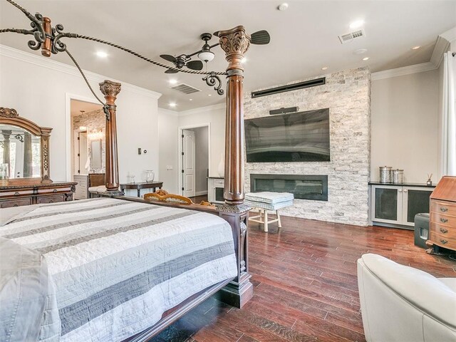 6363 NW 220th St, Edmond, OK 73025 - bedroom featuring recessed lighting, wood finished floors, visible vents, and crown molding
