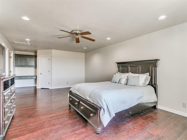 6363 NW 220th St, Edmond, OK 73025 - bedroom featuring baseboards, visible vents, recessed lighting, and dark wood-type flooring