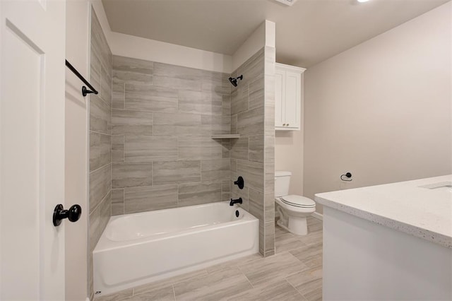 3404 Slate River Dr, Yukon, OK 73099 - bathroom featuring toilet, vanity, and shower / bathtub combination
