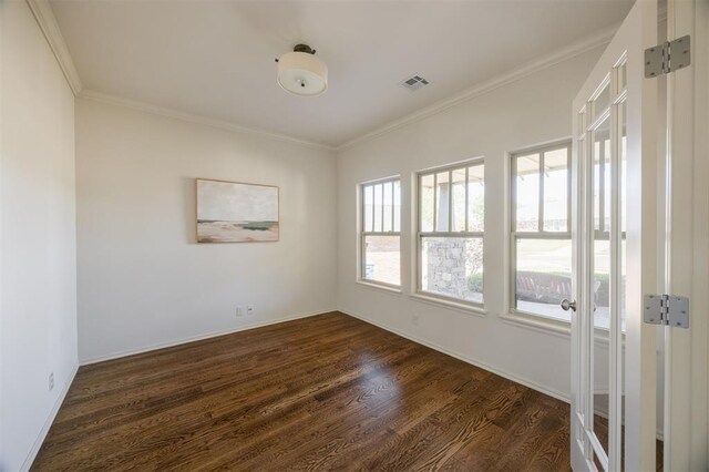 4940 Sonny Blues Pl, Edmond, OK 73034 - unfurnished room featuring baseboards, visible vents, dark wood-style floors, and crown molding
