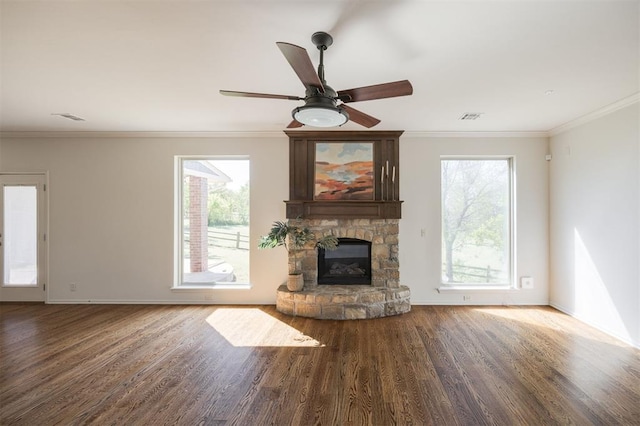 4940 Sonny Blues Pl, Edmond, OK 73034 - unfurnished living room with wood finished floors, a healthy amount of sunlight, baseboards, and ceiling fan