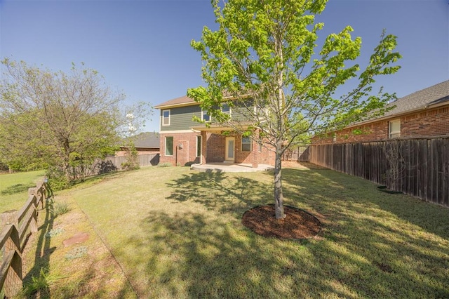 4940 Sonny Blues Pl, Edmond, OK 73034 - view of yard with a patio area and a fenced backyard