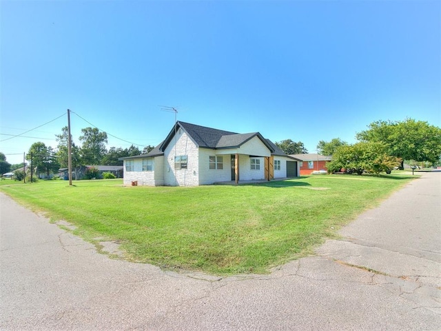 603 N Madison Ave, Blanchard, OK 73010 - ranch-style home with a front lawn