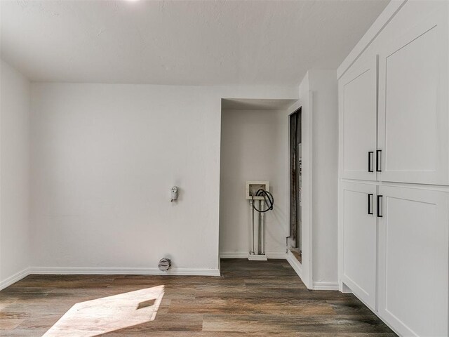 603 N Madison Ave, Blanchard, OK 73010 - clothes washing area featuring hookup for a washing machine, baseboards, and dark wood-style flooring