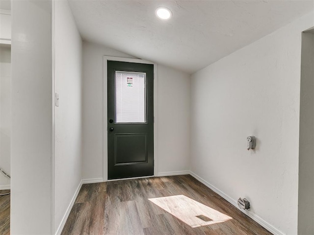 603 N Madison Ave, Blanchard, OK 73010 - entryway with lofted ceiling, baseboards, and wood finished floors