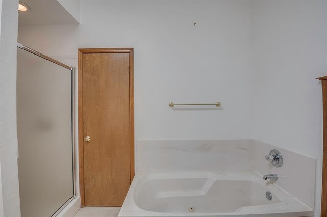 1117 Blue Ridge Dr, Edmond, OK 73003 - full bathroom with a stall shower and a bath