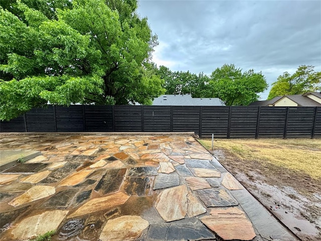 view of patio / terrace with fence