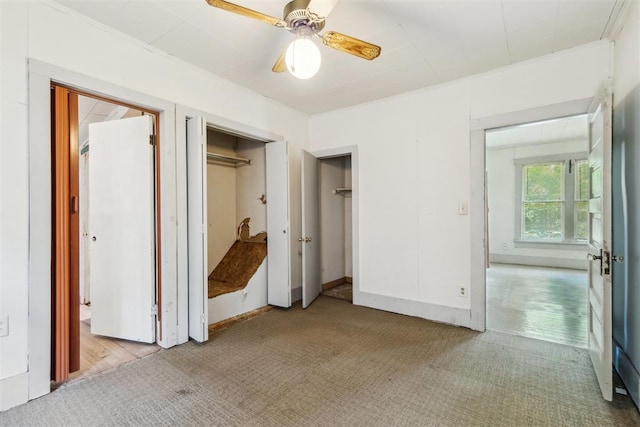 912 Classen Blvd, Norman, OK 73071 - unfurnished bedroom featuring carpet, crown molding, and ceiling fan