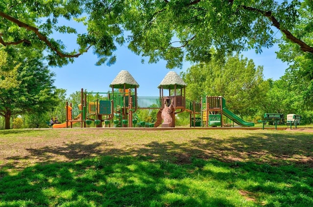 community playground featuring a yard