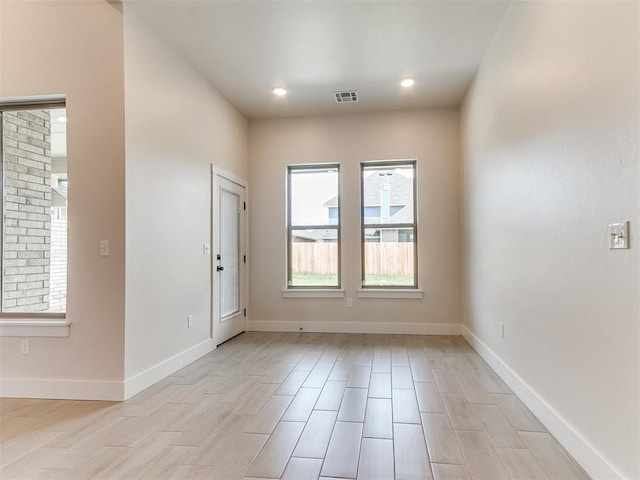 1715 Zayden Ln, Norman, OK 73072 - interior space featuring recessed lighting, visible vents, light wood-style flooring, and baseboards