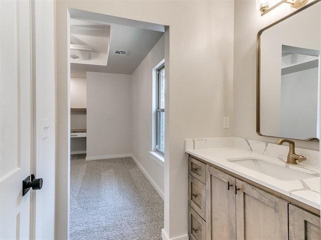1715 Zayden Ln, Norman, OK 73072 - bathroom with visible vents, vanity, and baseboards