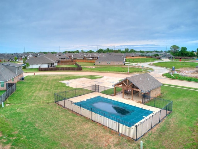 1715 Zayden Ln, Norman, OK 73072 - view of pool featuring a residential view, a fenced in pool, a yard, and fence