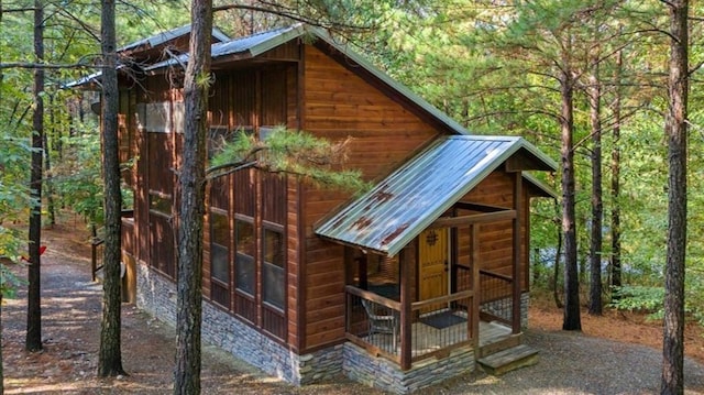 88 Bent Pine Trl, Broken Bow, OK 74728 - view of outdoor structure featuring a wooded view