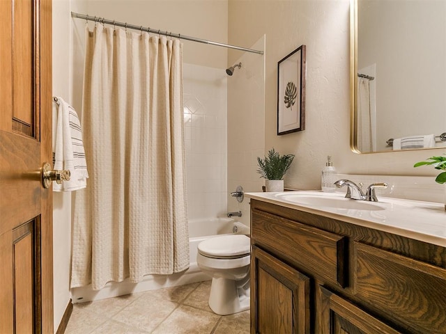 full bath featuring tile patterned floors, shower / tub combo with curtain, vanity, and toilet