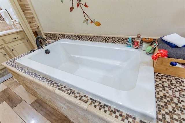 full bathroom featuring a garden tub