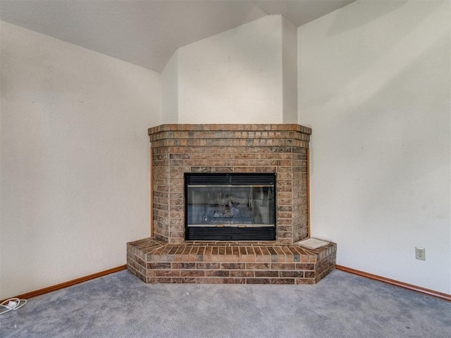 1717 Park View Pl, Edmond, OK 73003 - detailed view of carpet, a fireplace, and baseboards