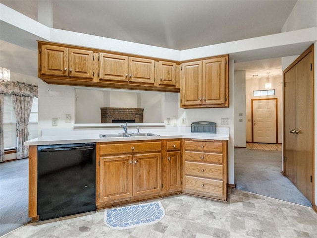 1717 Park View Pl, Edmond, OK 73003 - kitchen featuring dishwasher, a sink, light countertops, and brown cabinets