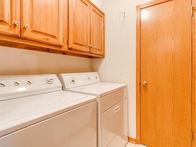 1717 Park View Pl, Edmond, OK 73003 - laundry room featuring independent washer and dryer and cabinet space