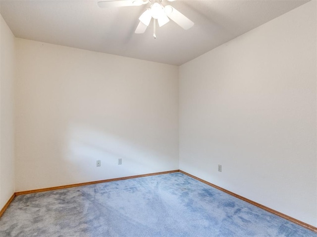 1717 Park View Pl, Edmond, OK 73003 - carpeted empty room featuring baseboards and a ceiling fan