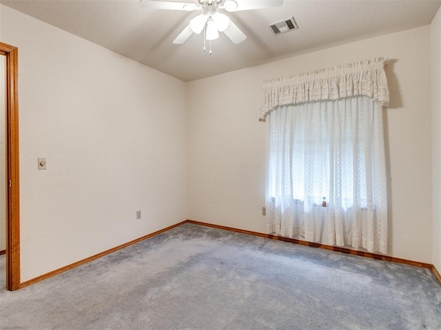1717 Park View Pl, Edmond, OK 73003 - carpeted empty room featuring ceiling fan and baseboards