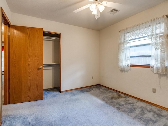 1717 Park View Pl, Edmond, OK 73003 - unfurnished bedroom featuring a closet, carpet floors, baseboards, and ceiling fan