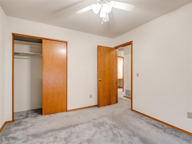 1717 Park View Pl, Edmond, OK 73003 - unfurnished bedroom featuring carpet flooring, a closet, baseboards, and ceiling fan