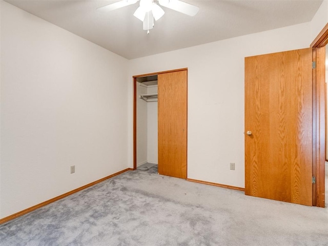 1717 Park View Pl, Edmond, OK 73003 - unfurnished bedroom featuring carpet floors, baseboards, a closet, and a ceiling fan