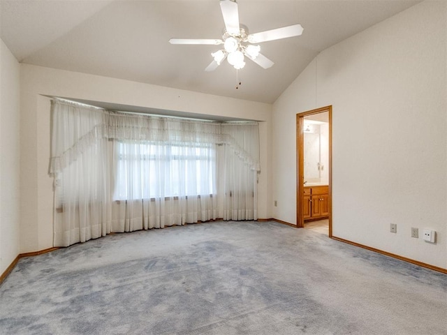 1717 Park View Pl, Edmond, OK 73003 - carpeted spare room with lofted ceiling, baseboards, and a ceiling fan