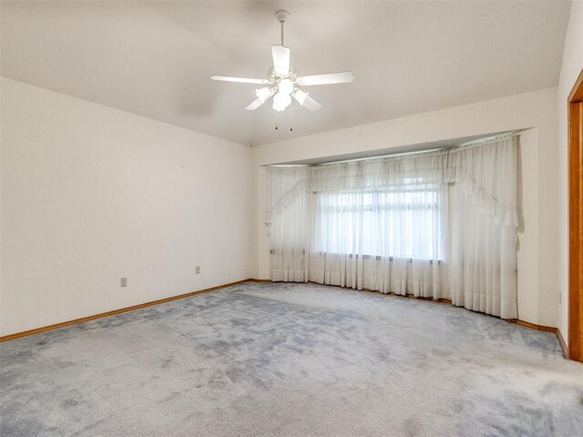 1717 Park View Pl, Edmond, OK 73003 - spare room with carpet flooring, baseboards, and ceiling fan