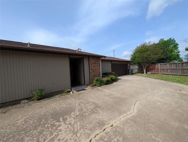 3207 Lois Arlene Cir, Moore, OK 73160 - view of front of property with an attached garage and fence