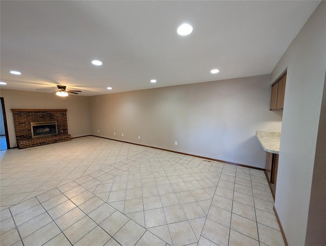 3207 Lois Arlene Cir, Moore, OK 73160 - unfurnished living room featuring recessed lighting, a fireplace, a ceiling fan, and light tile patterned floors