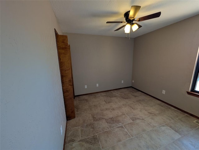 3207 Lois Arlene Cir, Moore, OK 73160 - empty room featuring baseboards and a ceiling fan