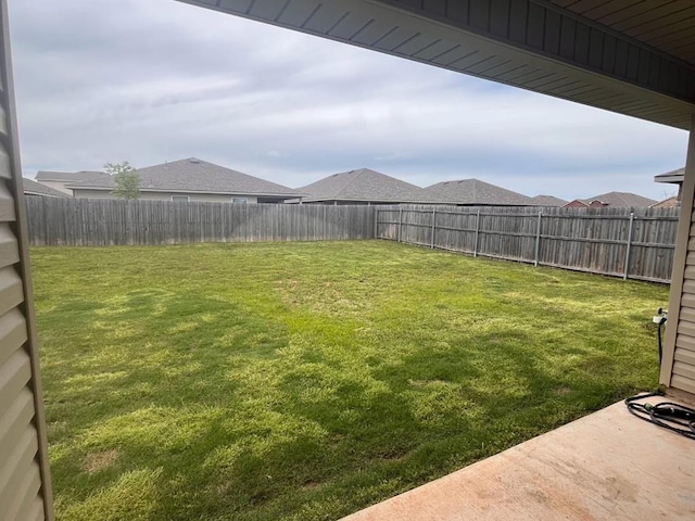 view of yard featuring a fenced backyard