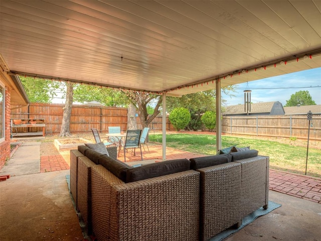 view of patio / terrace with outdoor dining area and a fenced backyard