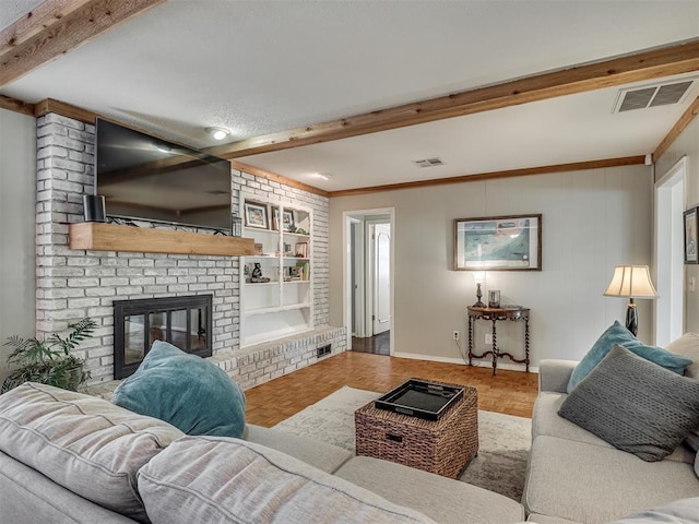 living area featuring a fireplace, beamed ceiling, and visible vents